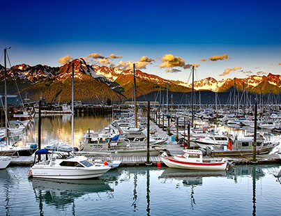 boaters enjoy a spectacular view from an Alaskan marina