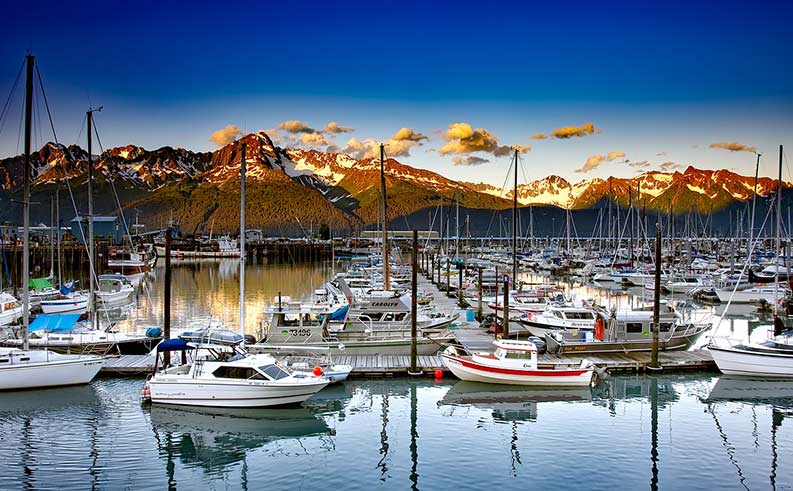 boaters enjoy a spectacular view from an Alaskan marina