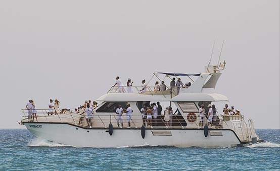 crowd of passengers on a charter boat