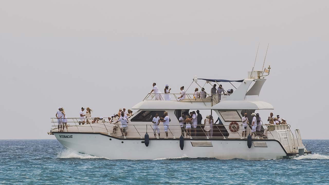 crowd of passengers on a charter boat