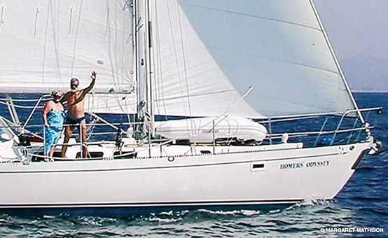 Stan and Lynn Homer aboard their sailboat