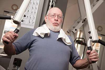 man exercising at the gym