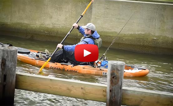 Angler Sean Danielson paddling his kayak