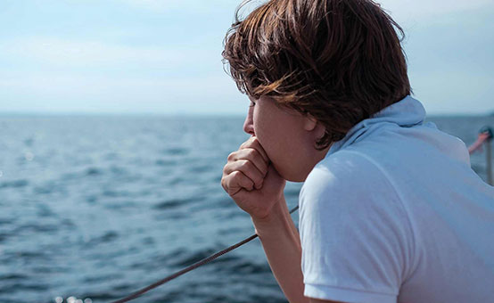 Woman suffering from sea sickness